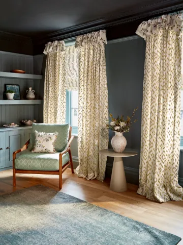 Villa Nova - Abloom P Livingroom Geo curtains with fading carpet & armchair